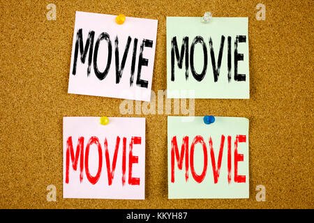 Conceptual hand writing text caption inspiration showing Movie Business concept for Entertainment Movie Film on colourful Sticky Note close-up Stock Photo