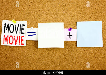 Conceptual announcement text caption inspiration showing Movie Business concept for Entertainment Movie Film written on Sticky Note on cork background Stock Photo