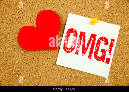 Conceptual hand writing text caption inspiration showing OMG Oh My God concept for Surprise Humor and Love written on sticky note, reminder cork backg Stock Photo