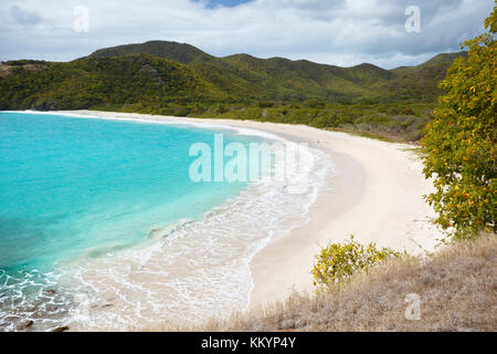 The pristine and hard to reach beach in the Rendezvous Bay in Antigua. Stock Photo