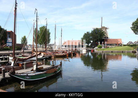 Harderwijk Vissershaven (Fishing Harbour, nowadays recreational), Harderwijk, The Netherlands. In background corn mill De Hoop. Stock Photo