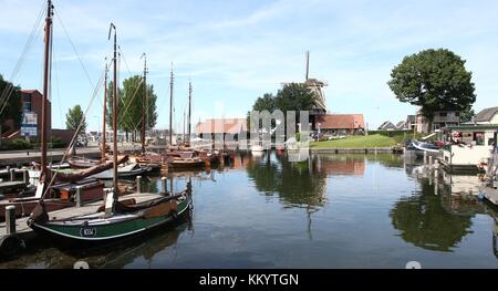 Harderwijk Vissershaven (Fishing Harbour, nowadays recreational), Harderwijk, The Netherlands. In background corn mill De Hoop.  Stitched image Stock Photo