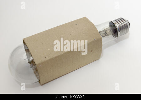 huge incandescent light bulb in a cardboard box Stock Photo