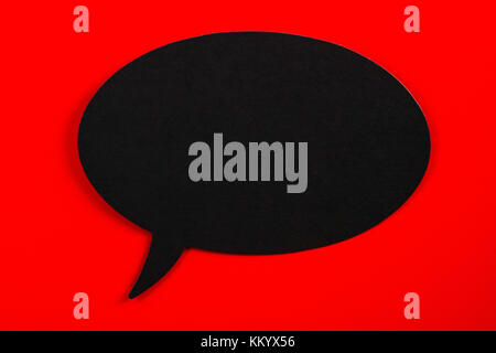 Blank speech bubble on red background Stock Photo
