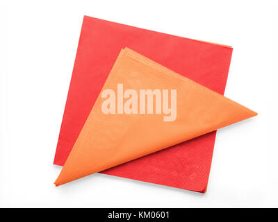 Red and orange colored paper napkins. Isolated on white, clipping path included Stock Photo