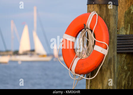 A life perserver hangs on a piling in Annapolis, Maryland. Stock Photo