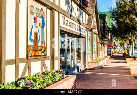 quaint shops in Danish style buildings with early morning sunlight in Solvang, California, US Stock Photo