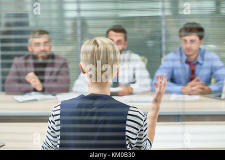 Discussing Start-up Project with Coworkers Stock Photo