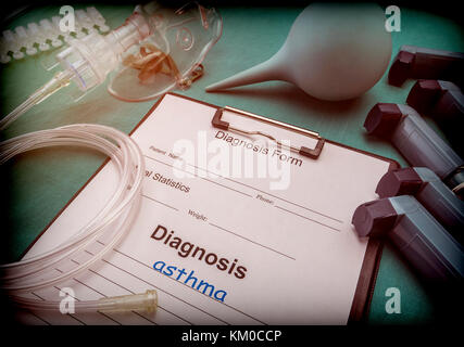 Diagnostic form, Asthma, Oxygen mask and inhalers in a hospital, conceptual image Stock Photo