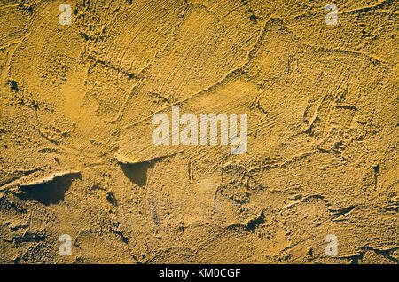 Yellow wall cement  vintage used as background Stock Photo