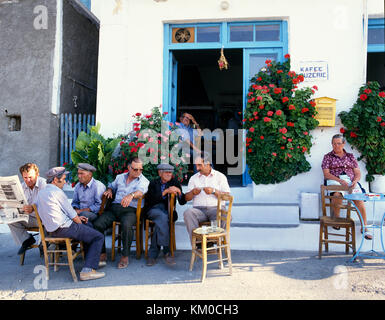 Meeting time for the old men at a cafe in Crete. Stock Photo