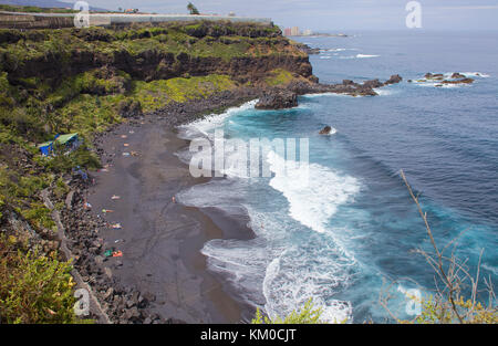 Playa El Bollullo, popular black sandy beach at El Rincon, Puerto de la Cruz, Tenerife island, Canary islands, Spain Stock Photo
