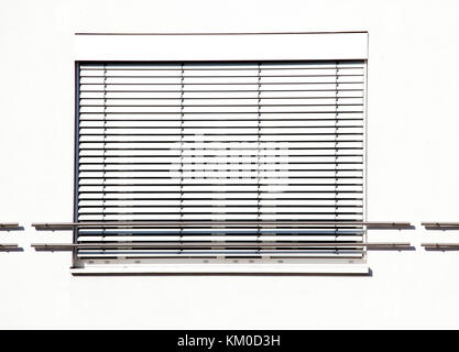 White Windows with closed shutters Stock Photo