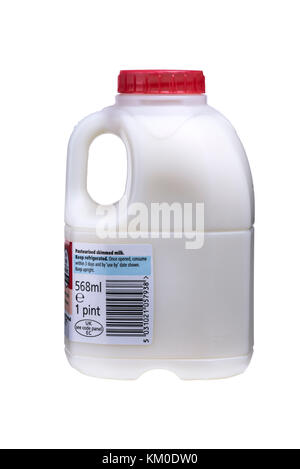Pint bottle red top skimmed milk. Stock Photo