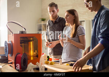 Designers Discussing 3D Printing in Studio Stock Photo