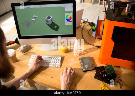 Digital Designer Working on 3D Model Stock Photo