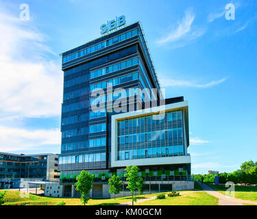 Vilnius, Lithuania - May 6, 2017: Office of SEB bank at modern skyscraper in business quarter of Baltupiai district, Vilnius, Lithuania Stock Photo