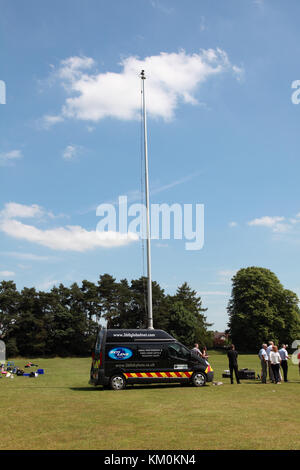A telescopic mast mounted on a van in order to take an aerial photograph Stock Photo