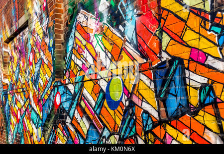 A wall of random colorful graffiti, Liverpool, UK Stock Photo