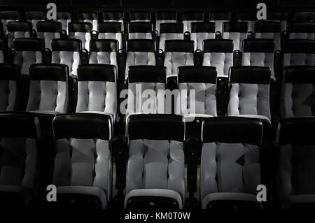 Empty auditorium in the cinema with comfortable seats Stock Photo