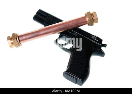Pipebomb and handgun Stock Photo