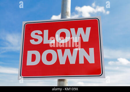 'Slow Down' road sign Stock Photo