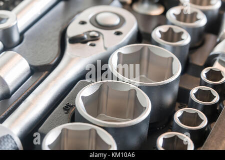 Sockets, tools, wrenches, spanners and bits in a chrome vanadium socket set. Stock Photo