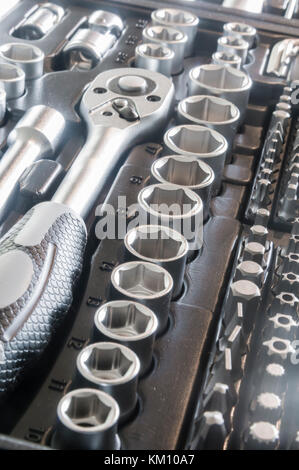 Sockets, tools, wrenches, spanners and bits in a chrome vanadium socket set. Stock Photo
