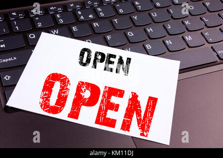 Writing Open text made in the office close-up on laptop computer keyboard. Business concept for shop Opening Workshop on the black background with spa Stock Photo