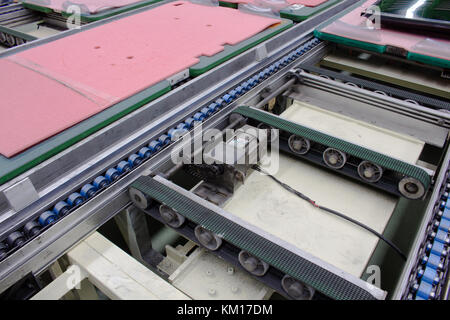 Electric motor and conveyor belt in factory Stock Photo