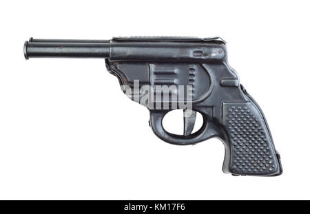 Toy metal old gun isolated on white background Stock Photo