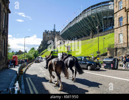 Mounted Police on patrol in Johnston Terrace, Edinburgh during the Edinburgh festival.