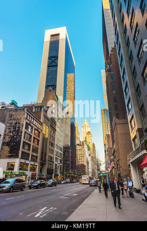 New York, USA - May 6, 2015: Junction of Avenue of the Americas, or Sixth Avenue and West 57th Street in Manhattan, NYC. 432 Park Avenue Building refl Stock Photo
