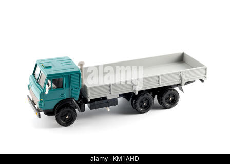 A small copy a flatbed truck on a white background made of metal Stock Photo