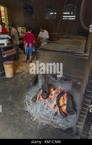 Texas, Caldwell County, Lockhart, Smitty's Market, barbecue restaurant, smoker, wood fire Stock Photo
