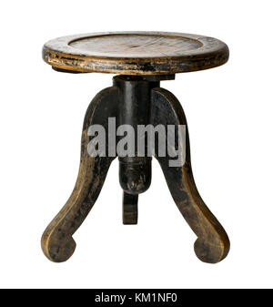 Old wooden chair for the piano on a white background Stock Photo