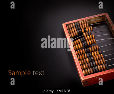 old wooden abacus on a dark background with place for text Stock Photo
