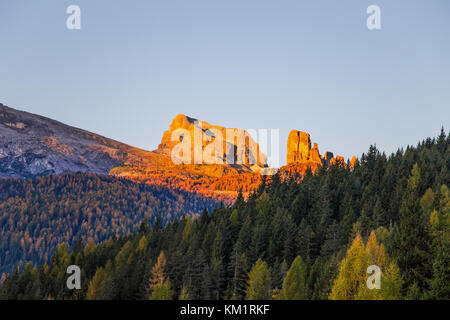 View of Five Towers Peaks (Cinque Torri) at sunrise from Falzarego pass in an autumn landscape in Dolomites, Italy. Stock Photo