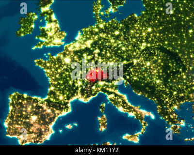 Satellite night view of Switzerland highlighted in red on planet Earth. 3D illustration. Elements of this image furnished by NASA. Stock Photo