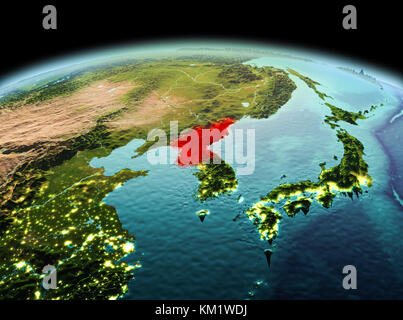 Morning above North Korea highlighted in red on model of planet Earth ...