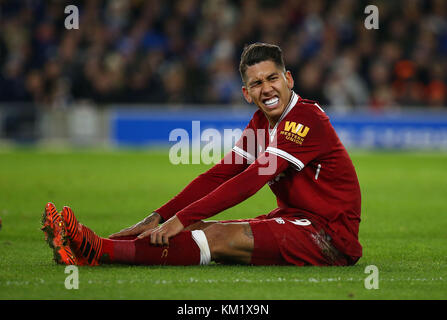 Roberto Firmino of Liverpool grimaces in pain during the Premier League match between Brighton and Hove Albion and Liverpool at the American Express Community Stadium in Brighton and Hove. 02 Dec 2017 *** EDITORIAL USE ONLY *** FA Premier League and Football League images are subject to DataCo Licence see www.football-dataco.com