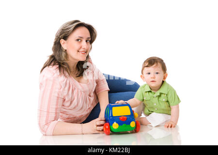 Mother playing with child holding car isolated on white Stock Photo