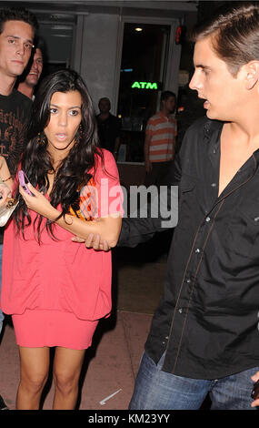 MIAMI BEACH - FL- DECEMBER 31, 2007:  Keeping Up With The Kardashians stars Kourtney and sister Khloe leaving a Miami Beach Nightclub   People;  Kourtney Kardashian: Khloe Kardashian Stock Photo