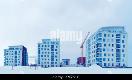 New complex of apartment buildings under development in winter Helsinki, Finland Stock Photo