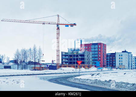 New complex of apartment buildings under development of winter Helsinki, Finland Stock Photo