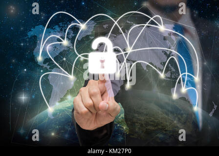 Businessman pointing or touching the key icon symbol with Part of earth network line background, Elements of this image furnished by NASA, Business sa Stock Photo