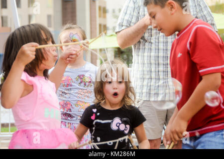 Kids Rock Fest with kids and bands having fun. Stock Photo