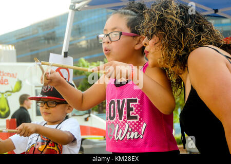 Kids Rock Fest with kids and bands having fun. Stock Photo