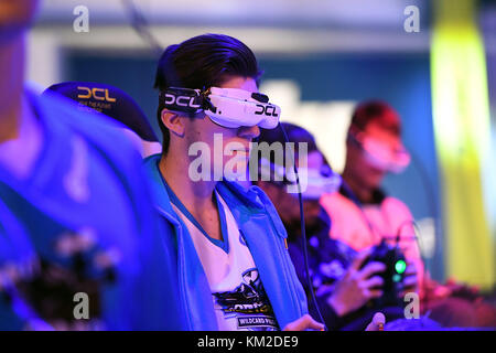 Berlin, Germany. 02nd Dec, 2017. Drone pilots controlling their drones as they race against each other in the track during the Drone Champions League (DCL) in Berlin, Germany, 02 December 2017. Credit: Maurizio Gambarini/dpa/Alamy Live News Stock Photo