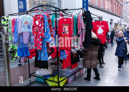Dublin, Ireland. 3rd Dec, 2017. Conor McGregor featured on the Christmas t-shirts. Busy Sunday on Henry street with merchants and shoppers getting ready for Christmas Stock Photo